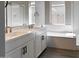 Double vanity bathroom with soaking tub and shower at 15922 W Electra Ln, Surprise, AZ 85379