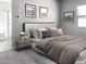 Spacious bedroom with plush bedding and en-suite bathroom access at 15922 W Electra Ln, Surprise, AZ 85379