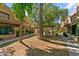 Residential community featuring a courtyard with walkways and seating at 1446 E Grovers Ave # 26, Phoenix, AZ 85022