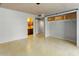 Spacious bedroom with built-in shelving and en-suite bathroom at 1446 E Grovers Ave # 26, Phoenix, AZ 85022