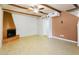 Living room with fireplace and wood beam accents at 1446 E Grovers Ave # 26, Phoenix, AZ 85022