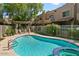 Community pool and spa with a relaxing patio area at 1446 E Grovers Ave # 26, Phoenix, AZ 85022