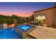 Relax in this luxurious outdoor spa adjacent to the refreshing pool at 8710 E Lost Gold Cir, Gold Canyon, AZ 85118