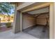 Attached garage with shelving for storage at 21320 N 56Th St # 2159, Phoenix, AZ 85054