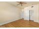 Bright bedroom with wood flooring and ceiling fan at 21320 N 56Th St # 2159, Phoenix, AZ 85054