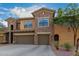Two-story home with stone accents and two-car garage at 21320 N 56Th St # 2159, Phoenix, AZ 85054