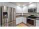 Modern kitchen with stainless steel appliances and granite countertops at 21320 N 56Th St # 2159, Phoenix, AZ 85054