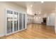 Spacious living room with hardwood floors and white shutters at 21320 N 56Th St # 2159, Phoenix, AZ 85054