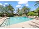 Refreshing community pool with surrounding landscaping at 21320 N 56Th St # 2159, Phoenix, AZ 85054