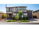 Two-story home with stone accents and landscaped yard at 17663 W Straight Arrow Ln, Surprise, AZ 85387