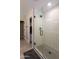 Large walk-in shower with subway tile and glass enclosure at 17663 W Straight Arrow Ln, Surprise, AZ 85387