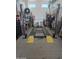 Spacious garage with four-post lift for car enthusiasts at 17663 W Straight Arrow Ln, Surprise, AZ 85387