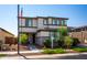 Two-story home with stone accents and landscaped yard at 17663 W Straight Arrow Ln, Surprise, AZ 85387