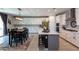 Modern kitchen with island, stainless steel appliances, and breakfast bar at 17663 W Straight Arrow Ln, Surprise, AZ 85387