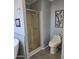 Clean bathroom with a shower, toilet, and updated vanity at 11596 W Sierra Dawn Blvd # 28, Surprise, AZ 85378