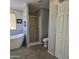 Bathroom featuring a shower, toilet, and modern flooring at 11596 W Sierra Dawn Blvd # 28, Surprise, AZ 85378