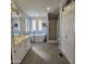 Elegant bathroom with double vanity, soaking tub, and walk-in shower at 11596 W Sierra Dawn Blvd # 28, Surprise, AZ 85378