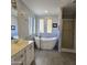Elegant bathroom with soaking tub, shower, and updated fixtures at 11596 W Sierra Dawn Blvd # 28, Surprise, AZ 85378