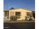 Charming single-story home with desert landscaping and covered entryway at 11596 W Sierra Dawn Blvd # 28, Surprise, AZ 85378