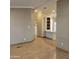 Kitchen with white cabinets, laminate countertops and hardwood floors at 11596 W Sierra Dawn Blvd # 28, Surprise, AZ 85378