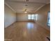 Spacious living room with hardwood floors and ceiling fan at 11596 W Sierra Dawn Blvd # 28, Surprise, AZ 85378
