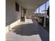 Covered patio area with concrete flooring and access to the home at 11596 W Sierra Dawn Blvd # 28, Surprise, AZ 85378