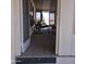 Relaxing screened porch with patio furniture, accessed from the mobile home at 11596 W Sierra Dawn Blvd # 28, Surprise, AZ 85378