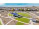 Expansive community park featuring multiple play areas, shaded seating, and open green space at 25227 N 131St Dr, Peoria, AZ 85383