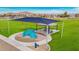 Community playground with shaded areas and play structures for children of all ages at 25227 N 131St Dr, Peoria, AZ 85383