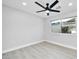Spacious bedroom with large window and ceiling fan at 6837 E Culver St, Scottsdale, AZ 85257