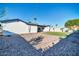 Large backyard with gravel, artificial turf, and a view of the house at 6837 E Culver St, Scottsdale, AZ 85257