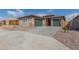 New construction home with two-car garage and attractive landscaping at 25227 N 131St Dr, Peoria, AZ 85383