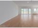 Spacious living area with large sliding doors leading to backyard at 25227 N 131St Dr, Peoria, AZ 85383