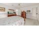 Bright bedroom with double dresser and floral bedding at 11009 E Keats Ave, Mesa, AZ 85209
