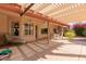 Patio area with pergola, seating, and grill at 11009 E Keats Ave, Mesa, AZ 85209