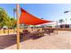 Community patio with shaded seating and tables at 11596 W Sierra Dawn Blvd # 28, Surprise, AZ 85378