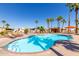 Inviting pool area with a spa and shaded seating at 11596 W Sierra Dawn Blvd # 28, Surprise, AZ 85378