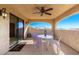 Relaxing balcony with mountain views and seating area at 6710 E Rockaway Hills Rd, Cave Creek, AZ 85331