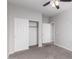 Bedroom with ceiling fan and sliding door closet at 9290 W Troy Dr, Arizona City, AZ 85123