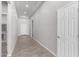 Bright entryway with grey tile flooring and neutral walls at 9290 W Troy Dr, Arizona City, AZ 85123