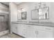 Modern bathroom with double vanity and shower at 9290 W Troy Dr, Arizona City, AZ 85123
