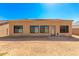 Backyard view of home with stucco exterior at 9290 W Troy Dr, Arizona City, AZ 85123
