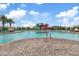 Community pool with water slides and lounge chairs at 5725 S 101St St, Mesa, AZ 85212