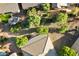Aerial view showcasing the property's expansive backyard and landscaping at 42929 W Castle Cove Cir, Maricopa, AZ 85138