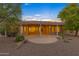 Home exterior showcasing a large backyard patio at 42929 W Castle Cove Cir, Maricopa, AZ 85138