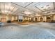 Large community room with dance floor and projector at 42929 W Castle Cove Cir, Maricopa, AZ 85138