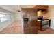 Kitchen features stainless steel appliances and tile flooring at 4502 W Crittenden Ln, Phoenix, AZ 85031
