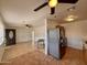 Kitchen and living room with tile floors at 4502 W Crittenden Ln, Phoenix, AZ 85031
