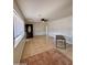 Living room features tile floors and lots of natural light at 4502 W Crittenden Ln, Phoenix, AZ 85031