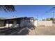 Updated single story home with a carport and newly paved driveway at 4502 W Crittenden Ln, Phoenix, AZ 85031